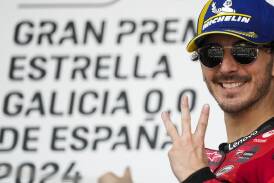 Italian MotoGP champ Francesco Bagnaia celebrates his hat-trick of Spanish Grand Prix wins. (AP PHOTO)
